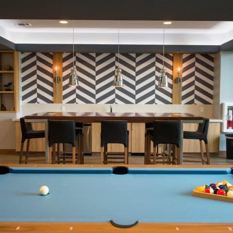 Pool table in the residences at harlan flats community room